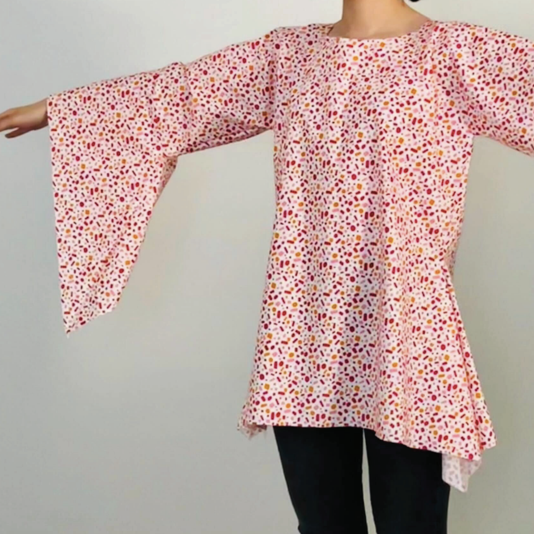 person modeling a shirt designed using the Wastebanned tool